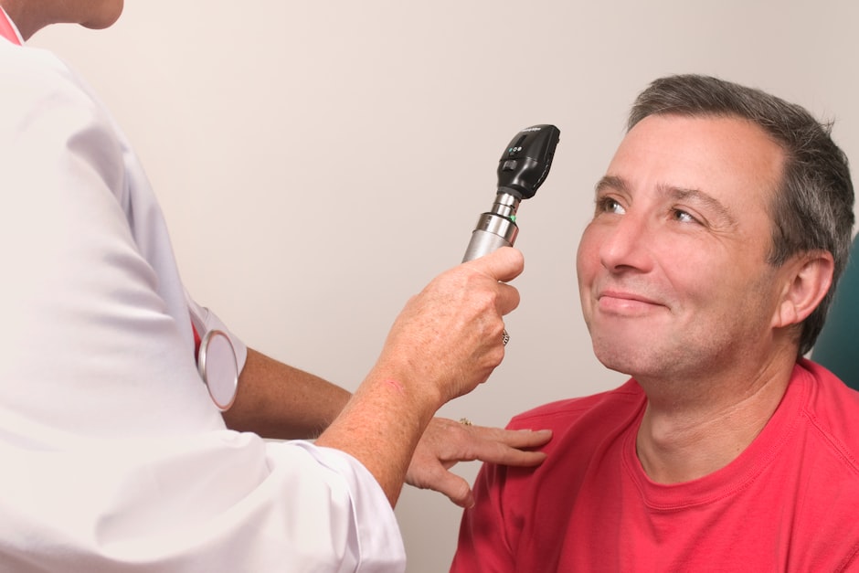An ophthalmologist examining a patient's eye before cataract surgery